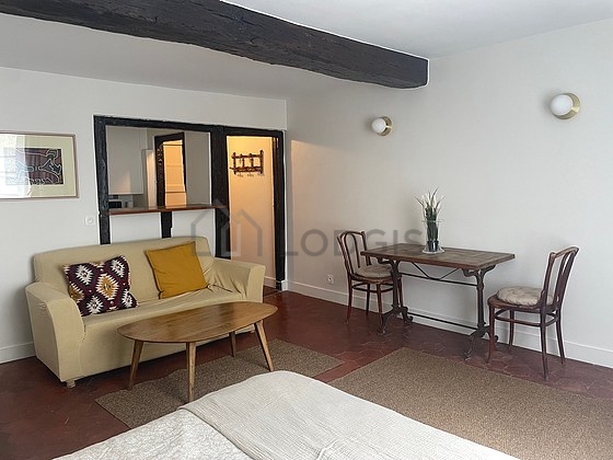 Living room furnished with 1 bed(s) of 120cm, 1 sofabed(s) of 140cm, tv, cupboard