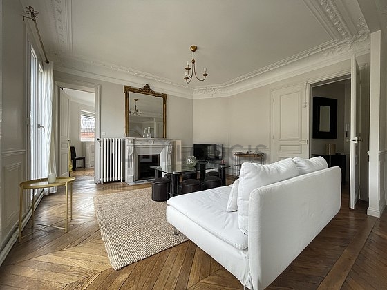 Living room furnished with sofa, coffee table, storage space, 1 chair(s)