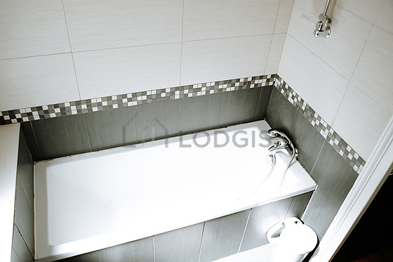 Bathroom equipped with shelves