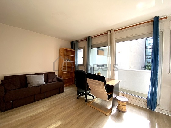 Very quiet living room furnished with tv, 1 chair(s)
