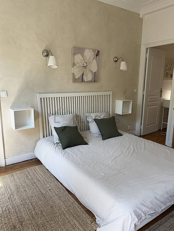 Bedroom with wooden floor