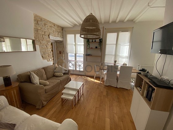Living room furnished with tv, 1 chair(s)