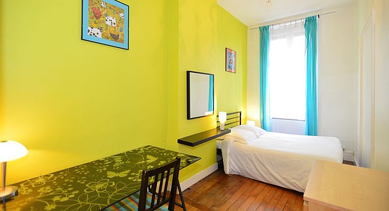 Bedroom with wooden floor