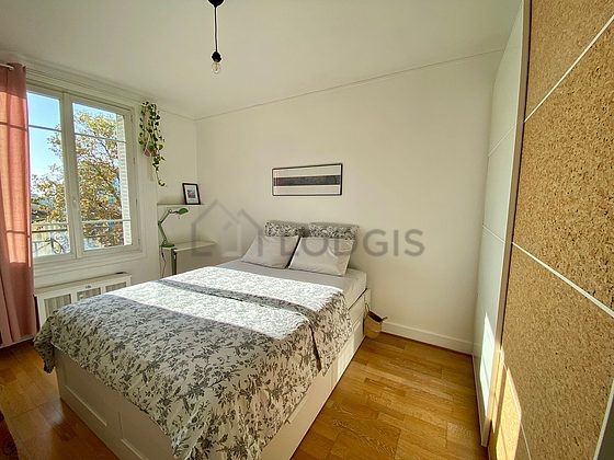 Bedroom with wooden floor