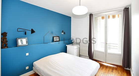 Bedroom with wooden floor