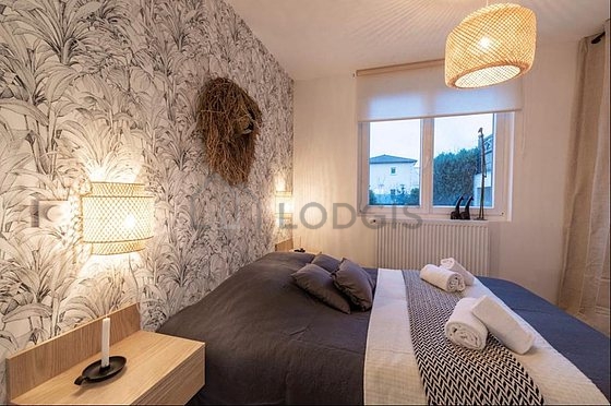 Bedroom with wooden floor