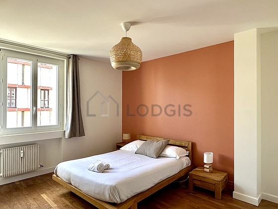 Bedroom with wooden floor