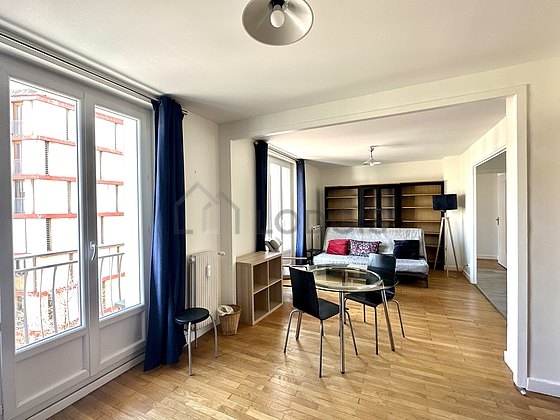 Living room furnished with tv, 1 armchair(s), 1 chair(s)