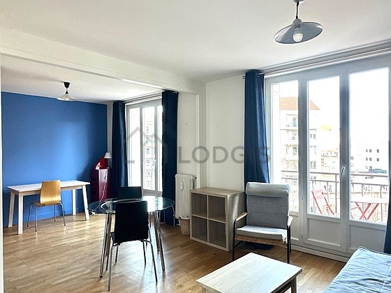 Living room with double-glazed windows and balcony