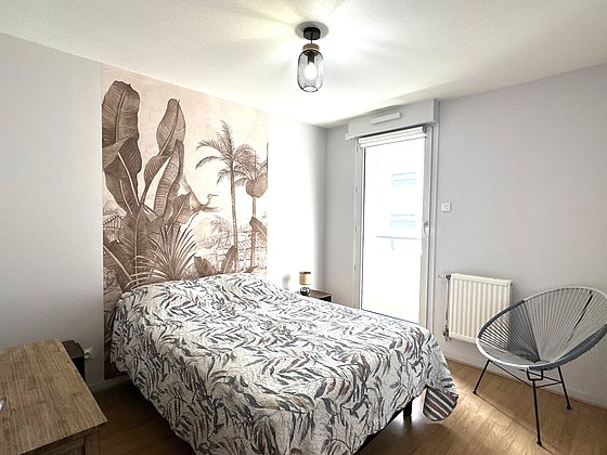 Bedroom with wooden floor