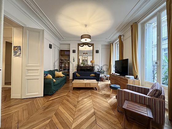 Living room furnished with tv, 1 armchair(s)
