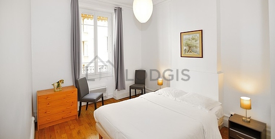 Bedroom with wooden floor