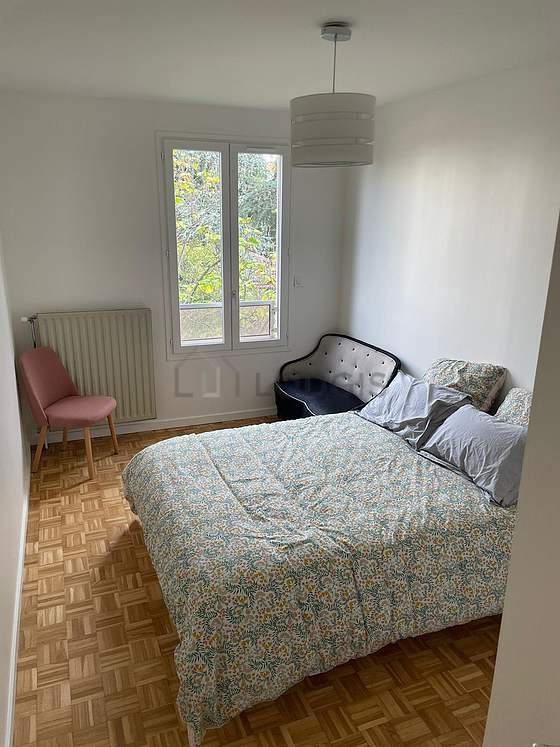 Bedroom with wooden floor