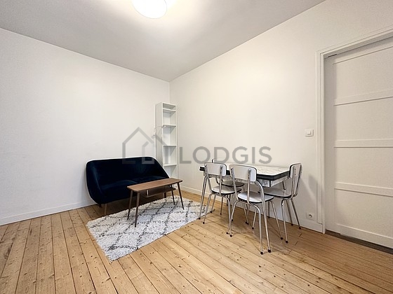 Quiet living room furnished with sofa, coffee table, 1 chair(s)