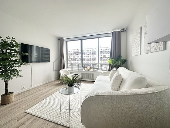Very quiet living room furnished with 1 bed(s) of 160cm, tv, 1 armchair(s)