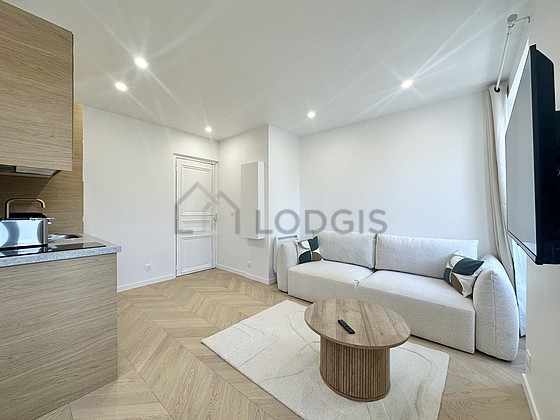 Quiet living room furnished with 1 sofabed(s) of 140cm, tv