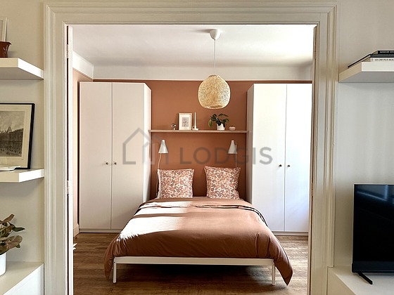 Bedroom with wooden floor