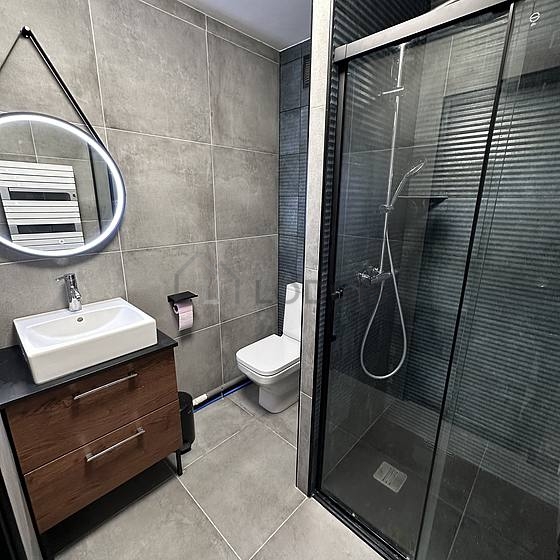 Pleasant and very bright bathroom with tile floor