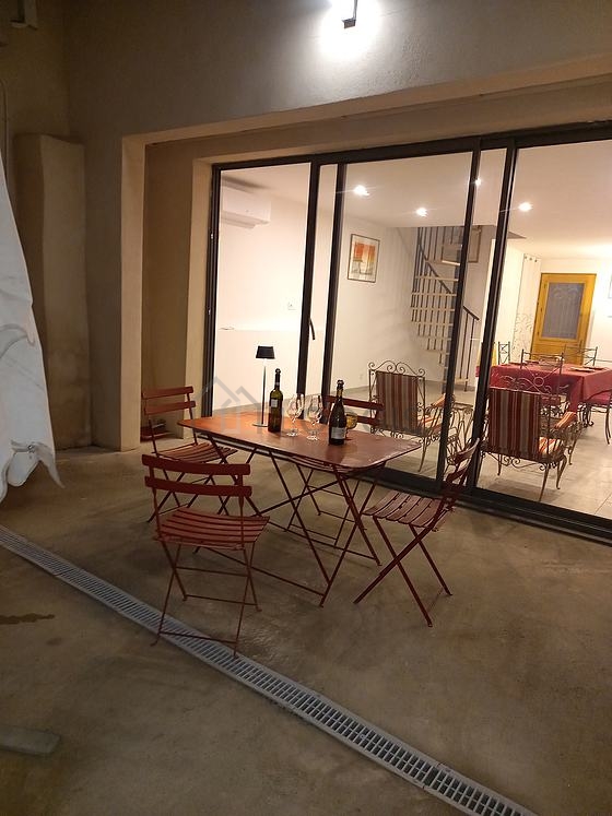 Patio with tile floor and equipped with 1 chair(s)