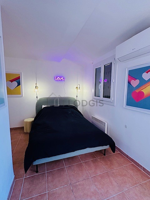 Bedroom with tile floor