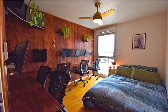 Bedroom with wooden floor