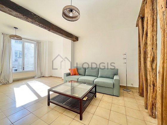 Very quiet living room furnished with tv, 3 chair(s)