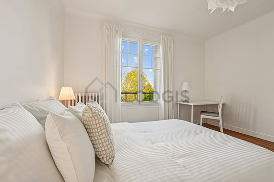 Bedroom with wooden floor