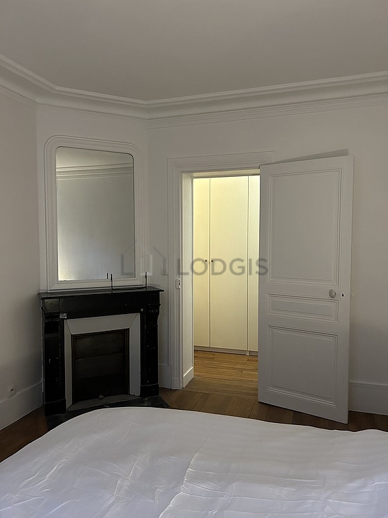 Bedroom with wooden floor