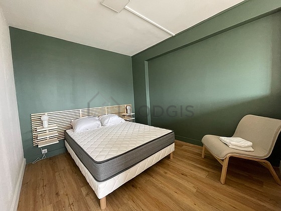 Bedroom with wooden floor
