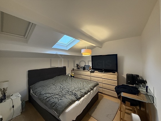 Bedroom with wooden floor