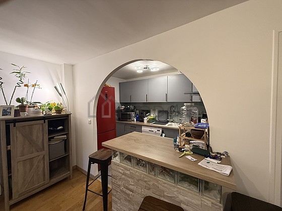 Kitchen equipped with dishwasher, hob, refrigerator