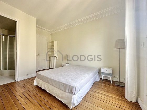 Bedroom with wooden floor