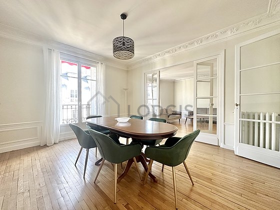 Dining room equipped with dining table, storage space