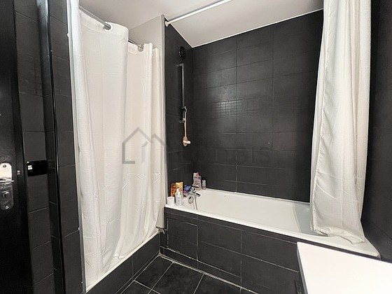 Bathroom equipped with bath tub, separate shower