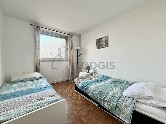 Bedroom with wooden floor