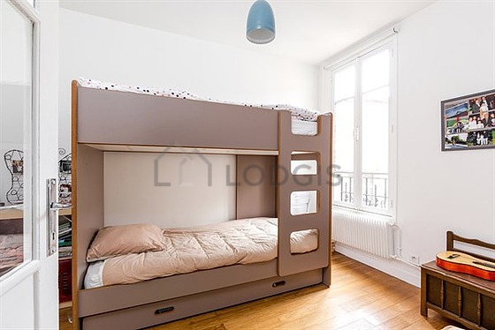 Bedroom with wooden floor