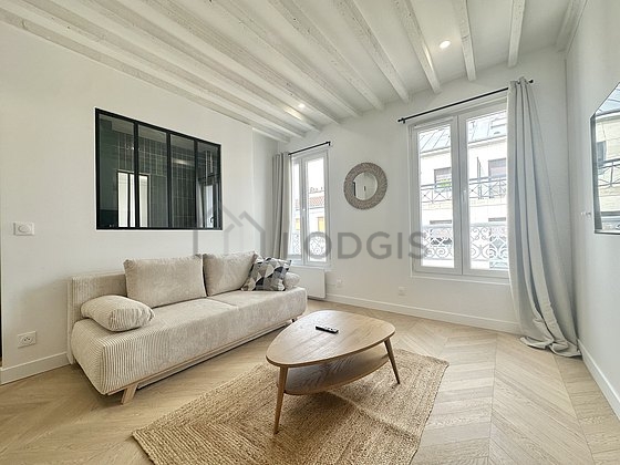 Quiet living room furnished with 1 sofabed(s) of 140cm, tv, cupboard