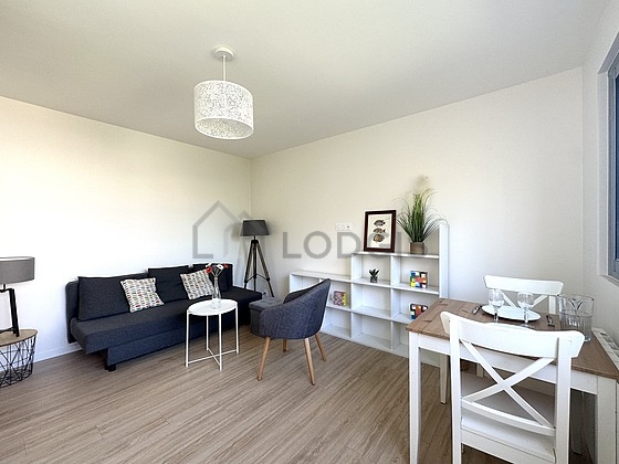 Living room furnished with sofa, 1 armchair(s)