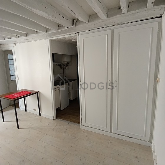 Living room with windows facing the courtyard