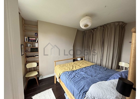 Bedroom with wooden floor