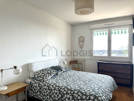 Bedroom with wooden floor