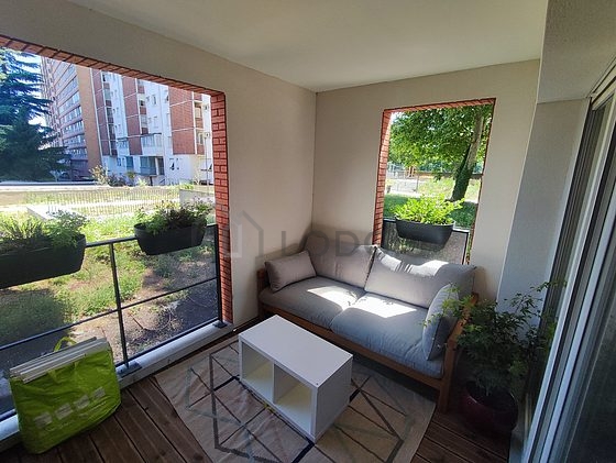 Living room furnished with sofa, coffee table, 1 chair(s)