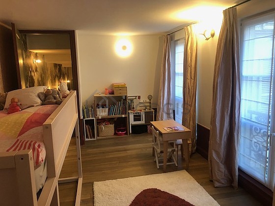 Bedroom with wooden floor