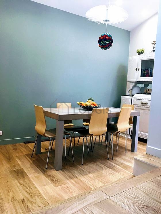 Dining room with wooden floor