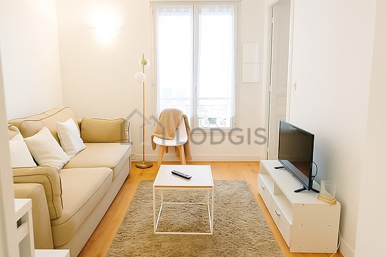 Living room furnished with tv, 1 chair(s)