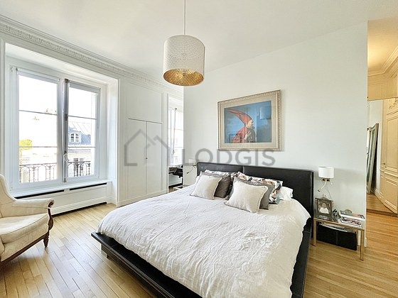 Bedroom with wooden floor