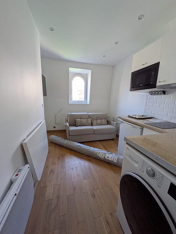 Living room furnished with 1 sofabed(s) of 140cm, tv