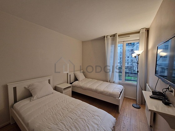 Bedroom with wooden floor