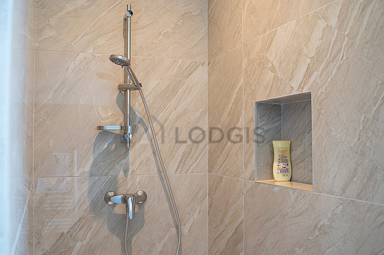 Bathroom equipped with separate shower, towel drying radiator