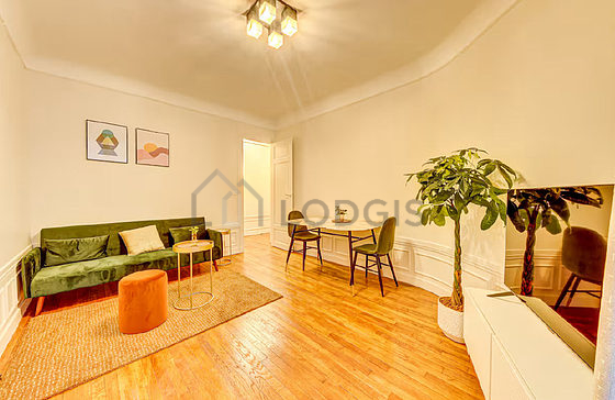 Living room furnished with tv, 2 chair(s)